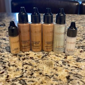 Unopened Luminess foundation (2x 060, 1x 070), primer, brightener, and cleaner.
